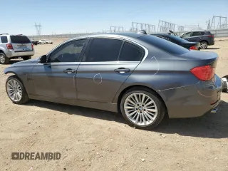 2013 BMW 3 Series 328i with VIN WBA3C1C56DF437440, listed as a Copart auction lot 61389475 with 122,736 mi miles and Salvage title. Bid and sale history available at DreamBid. Image 2.