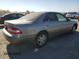 2000 Lexus ES 300 with VIN JT8BF28GXY5091263, listed as a Copart auction lot 61767595 with 250,041 mi miles and Salvage title. Bid and sale history available at DreamBid. Image 3.