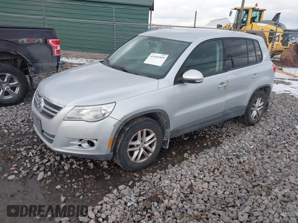 2011 Volkswagen Tiguan SEL with VIN WVGBV7AX5BW502741, listed as a IAAI auction lot 41441949 with 106,700 mi miles and . Bid and sale history available at DreamBid. Image 2.