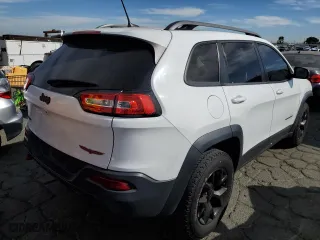 2018 Jeep Cherokee Trailhawk with VIN 1C4PJMBBXJD547143, listed as a Copart auction lot 70879803 with 84,693 mi miles and Salvage Title. Bid and sale history available at carsss.com. Image 3.