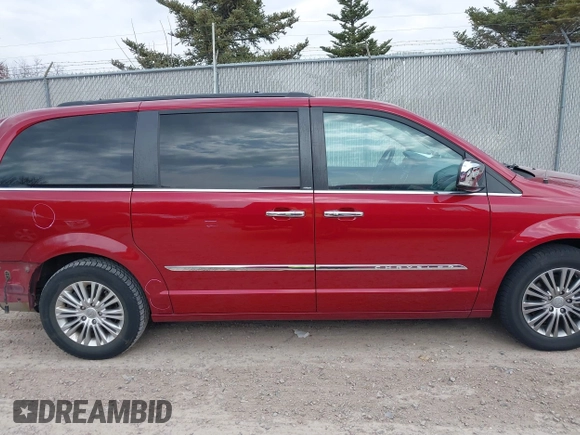 2014 Chrysler Town & Country Touring L with VIN 2C4RC1CGXER307492, listed as a IAAI auction lot 42021290 with 98,845 mi miles and . Bid and sale history available at carsss.com. Image 13.