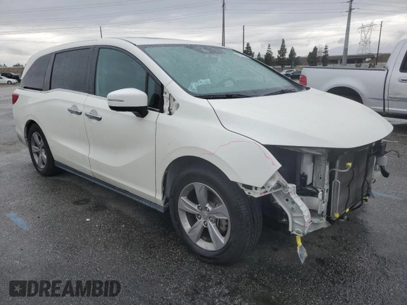 2018 Honda Odyssey EX-L with VIN 5FNRL6H77JB008571, listed as a Copart auction lot 46948585 with 88,699 mi miles and Salvage Title. Bid and sale history available at carsss.com. Image 4.