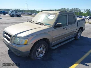 2004 Ford Explorer Sport Trac XLS with VIN 1FMZU67K24UA66100, listed as a IAAI auction lot 42035953 with 217,105 mi miles. Bid and sale history available at carsss.com. Image 2.