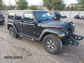 2020 Jeep Wrangler Unlimited Rubicon z VIN 1C4HJXFN8LW324066, wystawiony jako IAAI lot #41063646 z przebiegiem 31 698 mil mil oraz . Historia ofert i sprzedaży dostępna na DreamBid. Obrazek 1.