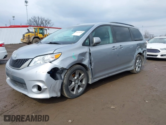 2011 Toyota Sienna SE with VIN 5TDXK3DC1BS096963, listed as a IAAI auction lot 41676328 with 168,436 mi miles. Bid and sale history available at carsss.com. Image 6.