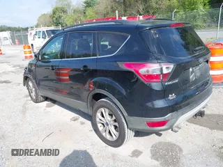 2017 Ford Escape SE with VIN 1FMCU9G91HUB56073, listed as a IAAI auction lot 42130463 with 94,275 mi miles and . Bid and sale history available at carsss.com. Image 3.