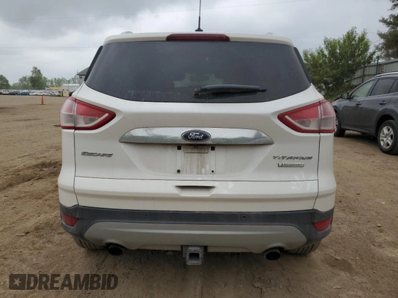 2014 Ford Escape Titanium с VIN 1FMCU0J97EUA87342, выставлен на аукционе Copart как лот 58790145 с пробегом 174 663 миль миль и Чистый • Clean title. История ставок и продаж доступна на DreamBid. Изображение 6.