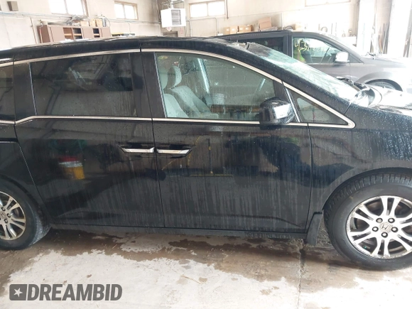 2012 Honda Odyssey EX z VIN 5FNRL5H4XCB017557, wystawiony jako IAAI lot #42367322 z przebiegiem 209 630 mil mil oraz . Historia ofert i sprzedaży dostępna na DreamBid. Obrazek 13.
