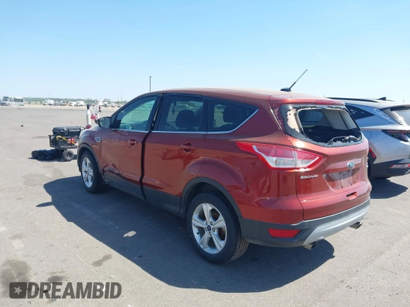 2014 Ford Escape SE with VIN 1FMCU9GX0EUC38743, listed as a IAAI auction lot 42258938 with 223,658 mi miles and . Bid and sale history available at DreamBid. Image 3.