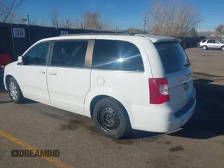 2015 Chrysler Town & Country LX with VIN 2C4RC1AG1FR678142, listed as a IAAI auction lot 41016680 with 78,756 mi miles and . Bid and sale history available at carsss.com. Image 3.