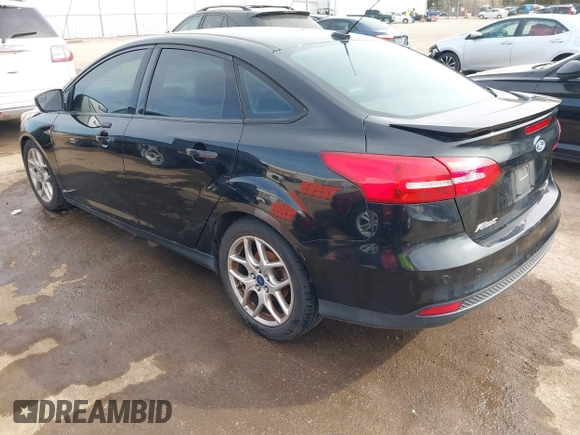 2015 Ford Focus SE with VIN 1FADP3F26FL356554, listed as a IAAI auction lot 41773139 with 143,911 mi miles. Bid and sale history available at carsss.com. Image 3.