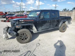 2022 Jeep Gladiator Texas Trail с VIN 1C6HJTAG6NL130312, выставлен на аукционе Copart как лот 44486505 с пробегом 62 474 миль миль и Списание • Salvage title. История ставок и продаж доступна на DreamBid. Изображение 1.