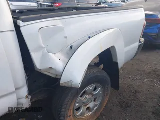 2014 Toyota Tacoma PreRunner with VIN 3TMJU4GN3EM162405, listed as a IAAI auction lot 40807077 with 103,298 mi miles. Bid and sale history available at carsss.com. Image 20.
