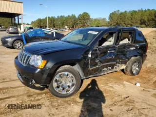 2009 Jeep Grand Cherokee with VIN 1J8HR68T19C550936, listed as a Copart auction lot 80090724 with 113,543 mi miles and Salvage title. Bid and sale history available at DreamBid. Image 1.