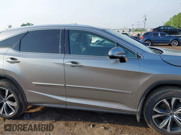 2022 Lexus RX 350 with VIN 2T2HZMAA6NC238967, listed as a IAAI auction lot 42294971 with 62,737 mi miles and . Bid and sale history available at DreamBid. Image 13.