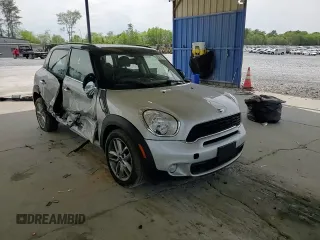 2014 MINI Countryman S with VIN WMWZC3C56EWP29211, listed as a Copart auction lot 52521145 with 91,396 mi miles and Salvage title. Bid and sale history available at DreamBid. Image 11.