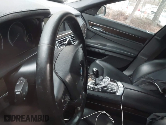 2013 BMW 7 Series 750i xDrive with VIN WBAYB6C59DD223947, listed as a IAAI auction lot 41585255 with Not provided miles and . Bid and sale history available at DreamBid. Image 7.