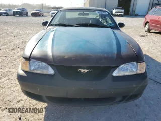 1997 Ford Mustang with VIN 1FALP4043VF174092, listed as a Copart auction lot 86983884 with 105,774 mi miles and Salvage Title. Bid and sale history available at carsss.com. Image 5.