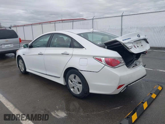 2012 Hyundai Sonata Hybrid with VIN KMHEC4A44CA038170, listed as a IAAI auction lot 41945015 with 90,404 mi miles and . Bid and sale history available at DreamBid. Image 3.