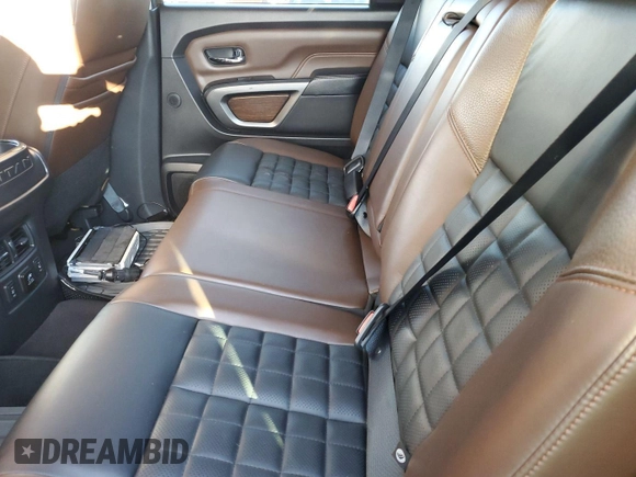 2016 Nissan Titan Platinum Reserve z VIN 1N6BA1F47GN502505, wystawiony jako IAAI lot #42520972 z przebiegiem 104 949 mil mil oraz . Historia ofert i sprzedaży dostępna na DreamBid. Obrazek 20.