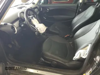 2011 MINI Hardtop with VIN WMWSU3C59BT099759, listed as a Copart auction lot 53995355 with 141,575 mi miles and Salvage Title. Bid and sale history available at DreamBid. Image 7.
