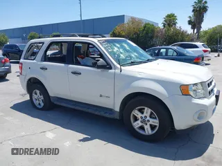 2009 Ford Escape Hybrid z VIN 1FMCU49319KA08837, wystawiony jako IAAI lot #42407340 z przebiegiem 172 856 mil mil oraz . Historia ofert i sprzedaży dostępna na DreamBid. Obrazek 1.