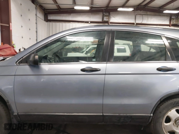 2009 Honda CR-V LX with VIN JHLRE48359C018488, listed as a IAAI auction lot 41824887 with 203,235 mi miles. Bid and sale history available at carsss.com. Image 14.