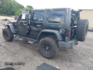 2012 Jeep Wrangler Unlimited Sport with VIN 1C4BJWDG8CL120308, listed as a IAAI auction lot 42365817 with 190,619 mi miles and . Bid and sale history available at DreamBid. Image 3.
