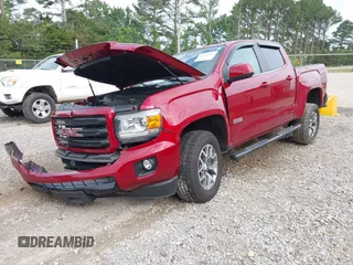 2019 GMC Canyon 4WD All Terrain z VIN 1GTG6FEN3K1139203, wystawiony jako IAAI lot #42194254 z przebiegiem 62 248 mil mil oraz . Historia ofert i sprzedaży dostępna na DreamBid. Obrazek 2.