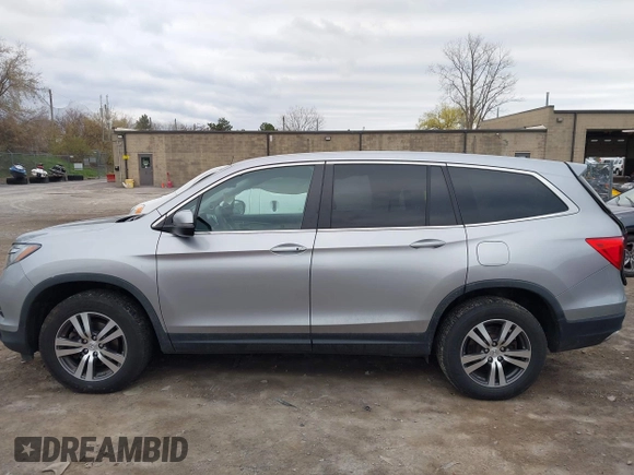 2017 Honda Pilot EX-L with VIN 5FNYF6H5XHB014067, listed as a IAAI auction lot 42083742 with 143,043 mi miles and . Bid and sale history available at DreamBid. Image 14.