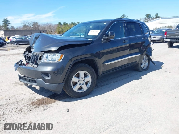 2011 Jeep Grand Cherokee Laredo z VIN 1J4RR4GG9BC519132, wystawiony jako IAAI lot #41931266 z przebiegiem 118 534 mil mil oraz . Historia ofert i sprzedaży dostępna na DreamBid. Obrazek 2.
