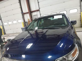 2011 Ford Taurus SEL with VIN 1FAHP2EW7BG174493, listed as a IAAI auction lot 41697856 with 143,957 mi miles. Bid and sale history available at carsss.com. Image 6.