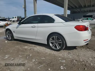 2016 BMW 4 Series 428i xDrive with VIN WBA3T1C52GP822072, listed as a Copart auction lot 87244184 with 80,946 mi miles and Salvage title. Bid and sale history available at DreamBid. Image 2.