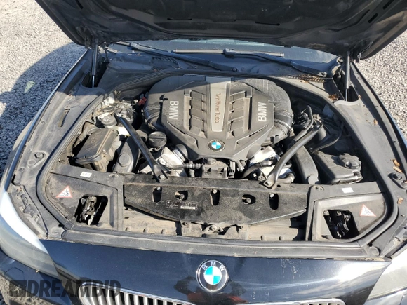 2013 BMW 5 Series 550i with VIN WBAFR9C59DDX79700, listed as a Copart auction lot 48565275 with 115,971 mi miles and Clean Title. Bid and sale history available at carsss.com. Image 11.