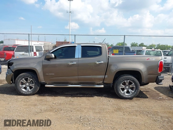 2015 Chevrolet Colorado 4WD Z71 with VIN 1GCGTCE38F1190708, listed as a IAAI auction lot 42686524 with 152,110 mi miles and . Bid and sale history available at DreamBid. Image 15.