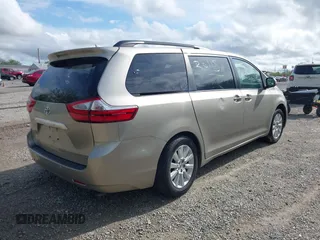 2015 Toyota Sienna XLE z VIN 5TDYK3DC6FS632493, wystawiony jako IAAI lot #42176411 z przebiegiem 172 929 mil mil oraz . Historia ofert i sprzedaży dostępna na DreamBid. Obrazek 4.