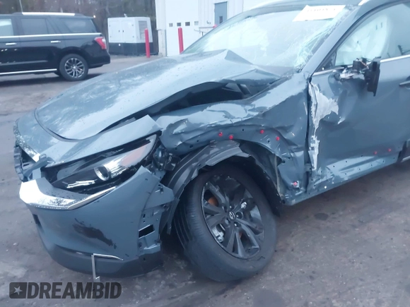 2023 Mazda CX-30 S Carbon Edition with VIN 3MVDMBCM5PM545150, listed as a IAAI auction lot 41104881 with 30,459 mi miles and . Bid and sale history available at DreamBid. Image 6.