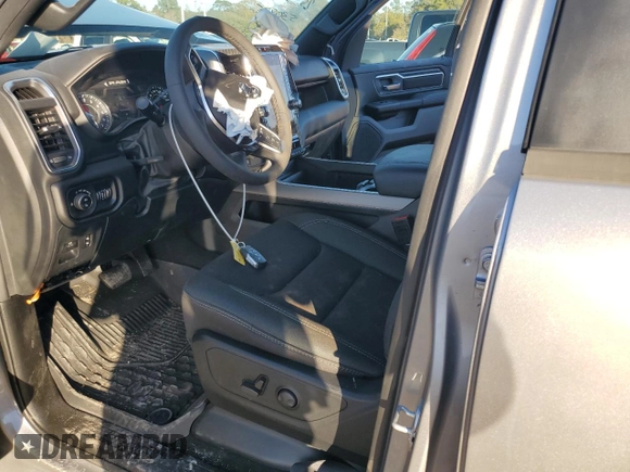 2025 Ram 1500 Big Horn with VIN 1C6RREFG2SN530885, listed as a Copart auction lot 87261914 with 3,814 mi miles and Salvage title. Bid and sale history available at DreamBid. Image 7.