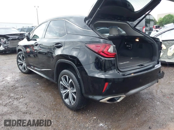 2016 Lexus RX 350 z VIN 2T2ZZMCA6GC005692, wystawiony jako IAAI lot #42147337 z przebiegiem 132 363 mil mil oraz . Historia ofert i sprzedaży dostępna na DreamBid. Obrazek 3.