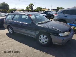 1996 Subaru Legacy with VIN 4S3BG4859T6986223, listed as a Copart auction lot 57683345 with 265,568 mi miles and Salvage title. Bid and sale history available at DreamBid. Image 4.