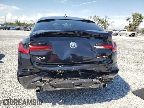 2021 BMW X4 xDrive30i z VIN 5UX2V1C09M9G11692, wystawiony jako Copart lot #51512115 z przebiegiem 16 948 mil mil oraz Szkoda całkowita • Salvage title. Historia ofert i sprzedaży dostępna na DreamBid. Obrazek 6.