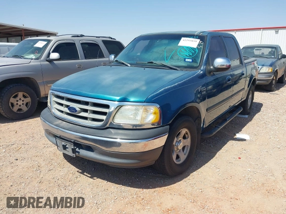 2001 Ford F-150 XLT with VIN 1FTRW07W01KA75819, listed as a IAAI auction lot 42293859 with 156,137 mi miles and . Bid and sale history available at DreamBid. Image 2.