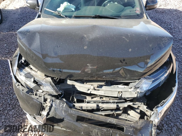 2018 Mitsubishi Outlander SE with VIN JA4AD3A39JZ022167, listed as a Copart auction lot 57228095 with 111,104 mi miles and Salvage title. Bid and sale history available at DreamBid. Image 12.