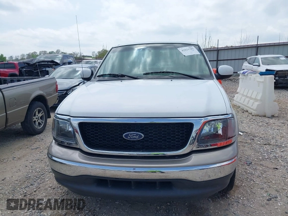 2003 Ford F-150 XL with VIN 1FTRX17L33NB79733, listed as a IAAI auction lot 42023385 with 136,236 mi miles. Bid and sale history available at carsss.com. Image 12.