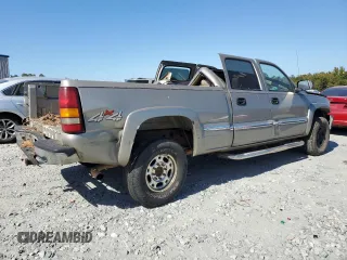 2002 GMC Sierra 1500HD SLE z VIN 1GTGK13U52F232896, wystawiony jako Copart lot #76999294 z przebiegiem Nie podano mil oraz Szkoda całkowita • Salvage title. Historia ofert i sprzedaży dostępna na DreamBid. Obrazek 3.