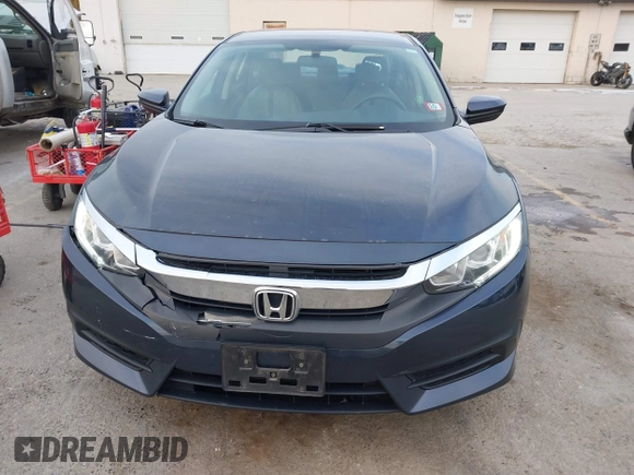 2017 Honda Civic LX z VIN 19XFC2F52HE028823, wystawiony jako IAAI lot #41312009 z przebiegiem 56 462 mil mil oraz . Historia ofert i sprzedaży dostępna na DreamBid. Obrazek 12.