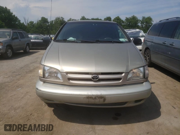 2000 Toyota Sienna LE with VIN 4T3ZF13C8YU219698, listed as a Copart auction lot 59733984 with 305,061 mi miles and Salvage Title. Bid and sale history available at carsss.com. Image 6.