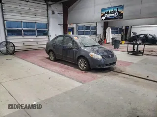 2011 Suzuki SX4 LE with VIN JS2YC5A20B6304734, listed as a Copart auction lot 87377154 with 190,761 mi miles and Salvage Title. Bid and sale history available at carsss.com. Image 10.
