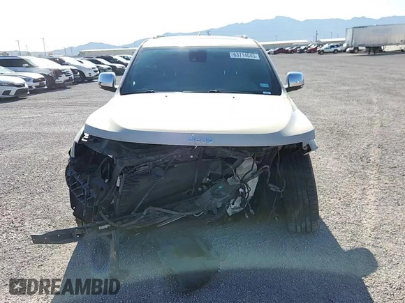 2015 Jeep Grand Cherokee Summit with VIN 1C4RJEJG9FC952192, listed as a Copart auction lot 63714045 with 147,732 mi miles and Salvage title. Bid and sale history available at DreamBid. Image 13.