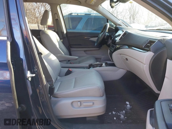 2017 Honda Pilot Touring with VIN 5FNYF6H99HB105446, listed as a IAAI auction lot 41283368 with 91,452 mi miles and . Bid and sale history available at DreamBid. Image 5.
